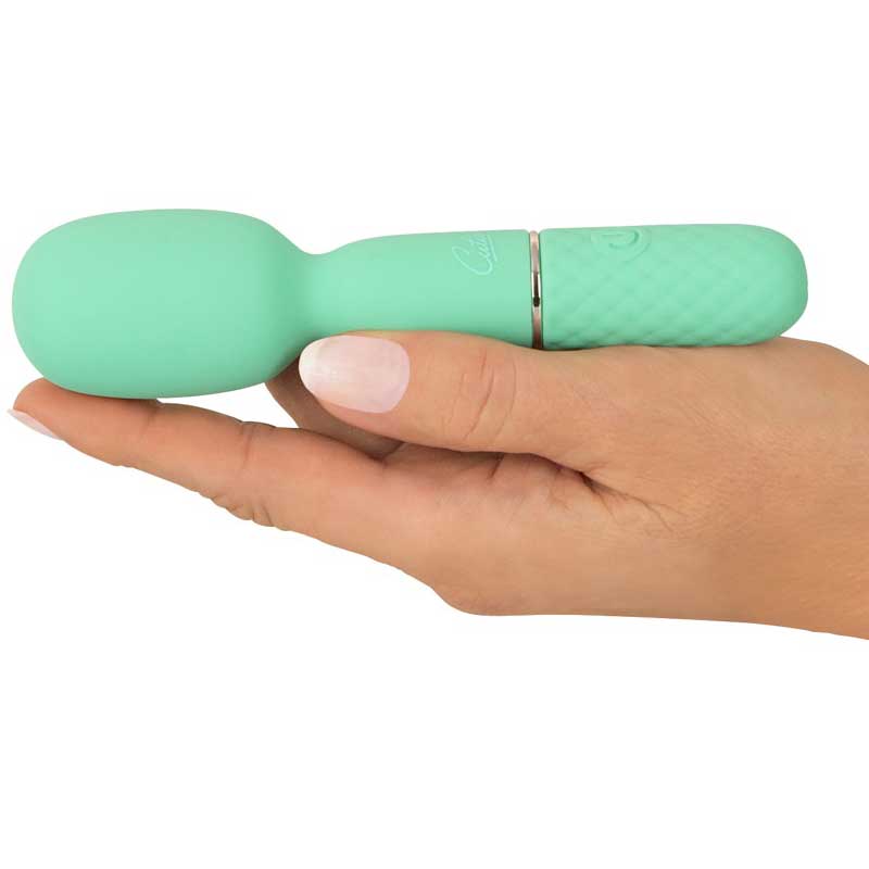 Mini Vibrator Cuties auf einer Hand liegend.